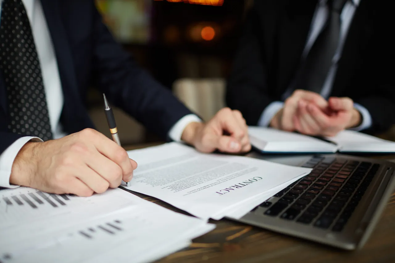 Attorney signing.