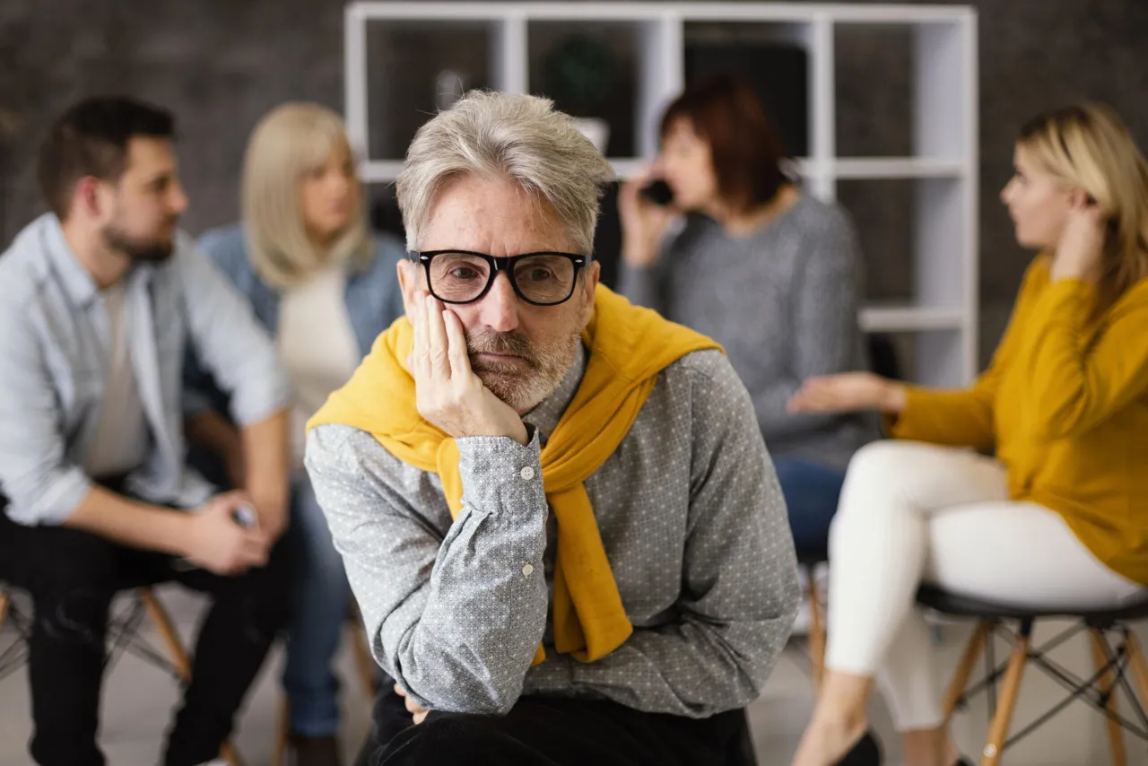 Family discussing important care decisions for an aging loved one