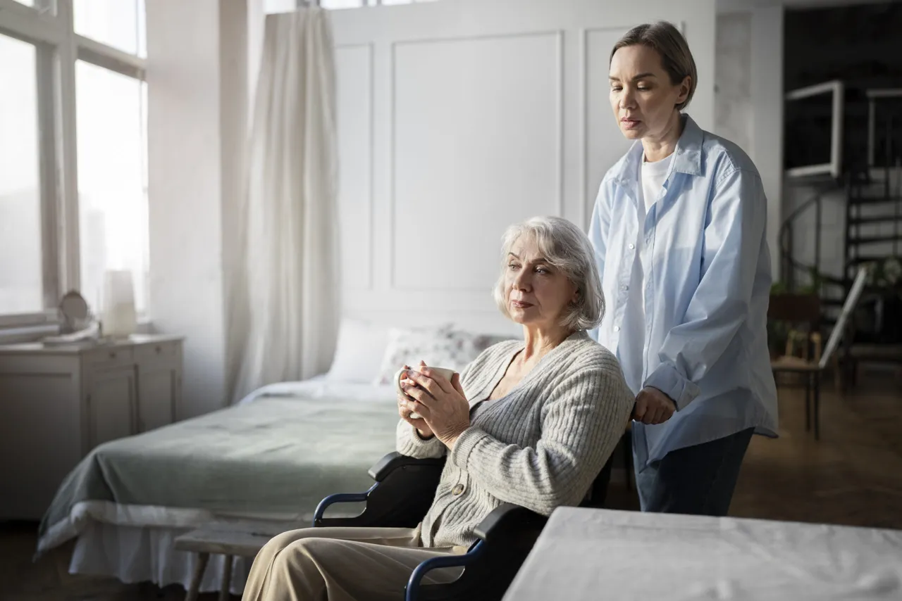 Older adult discussing healthcare and future care planning with her physician